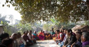 people gathering under a tree for loadsheding. representional photo